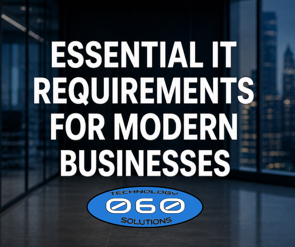 Essential IT Requirements for Modern Businesses — modern office workspace with computer and tech visuals.